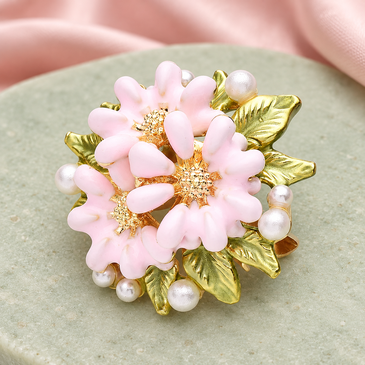 Pink Flower Cluster with Pearlescent Accents Brooch — styled background