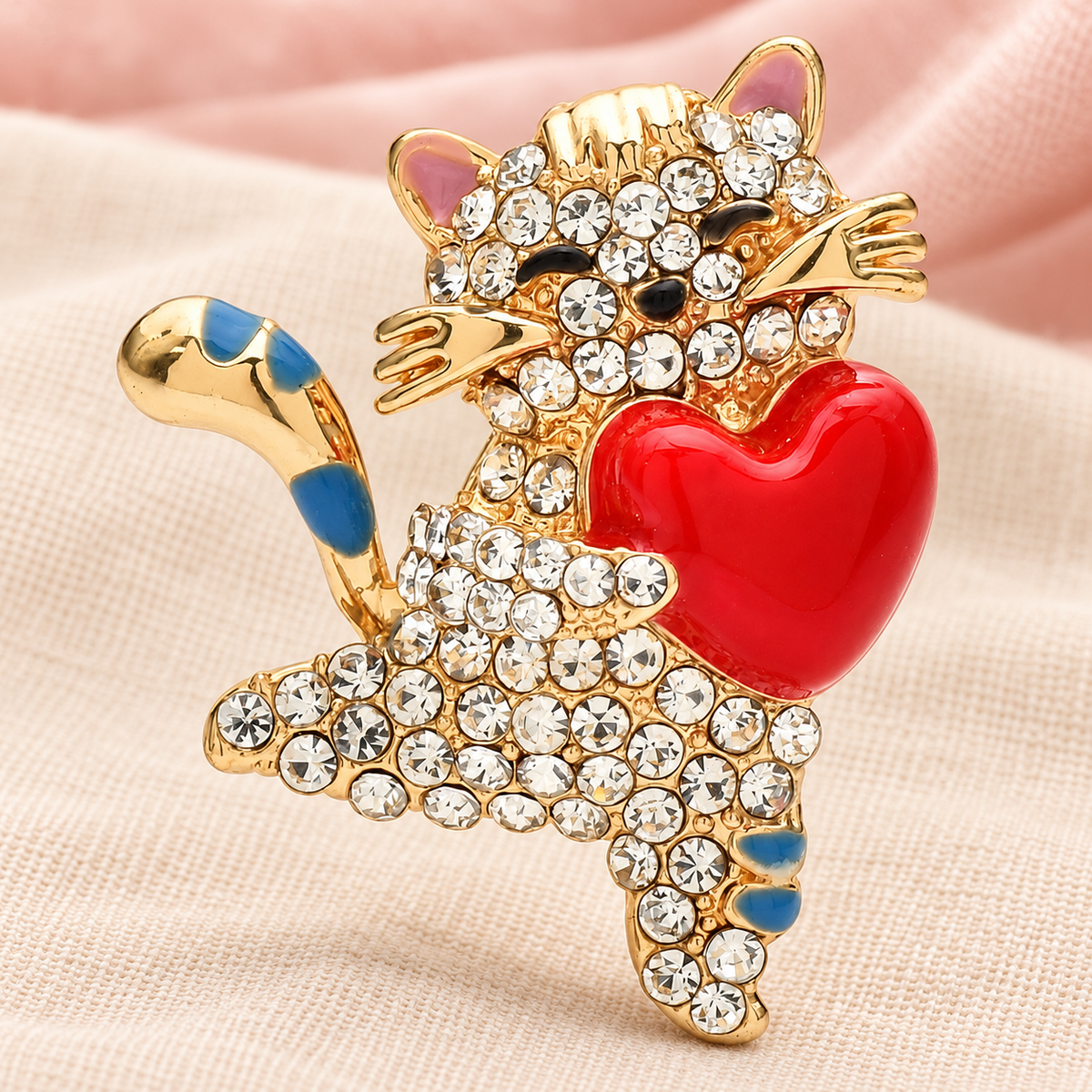 Sparkling Cat Holding a Red Heart Brooch — styled background