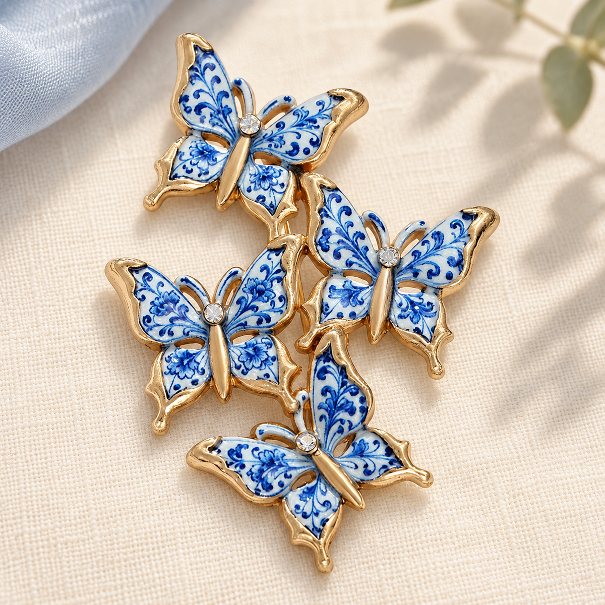 Blue and White Butterfly Cluster Brooch — styled background