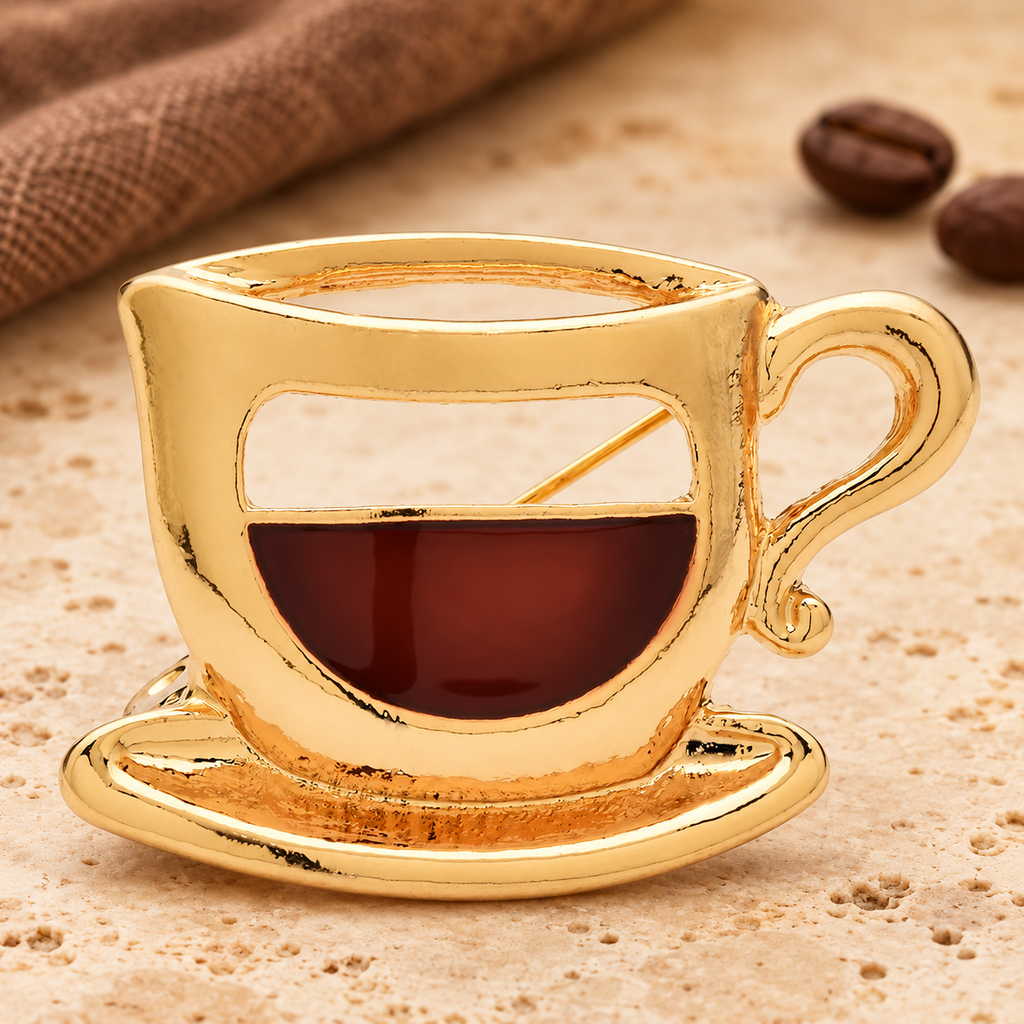 Enamel Coffee Cup and Saucer Brooch — styled background