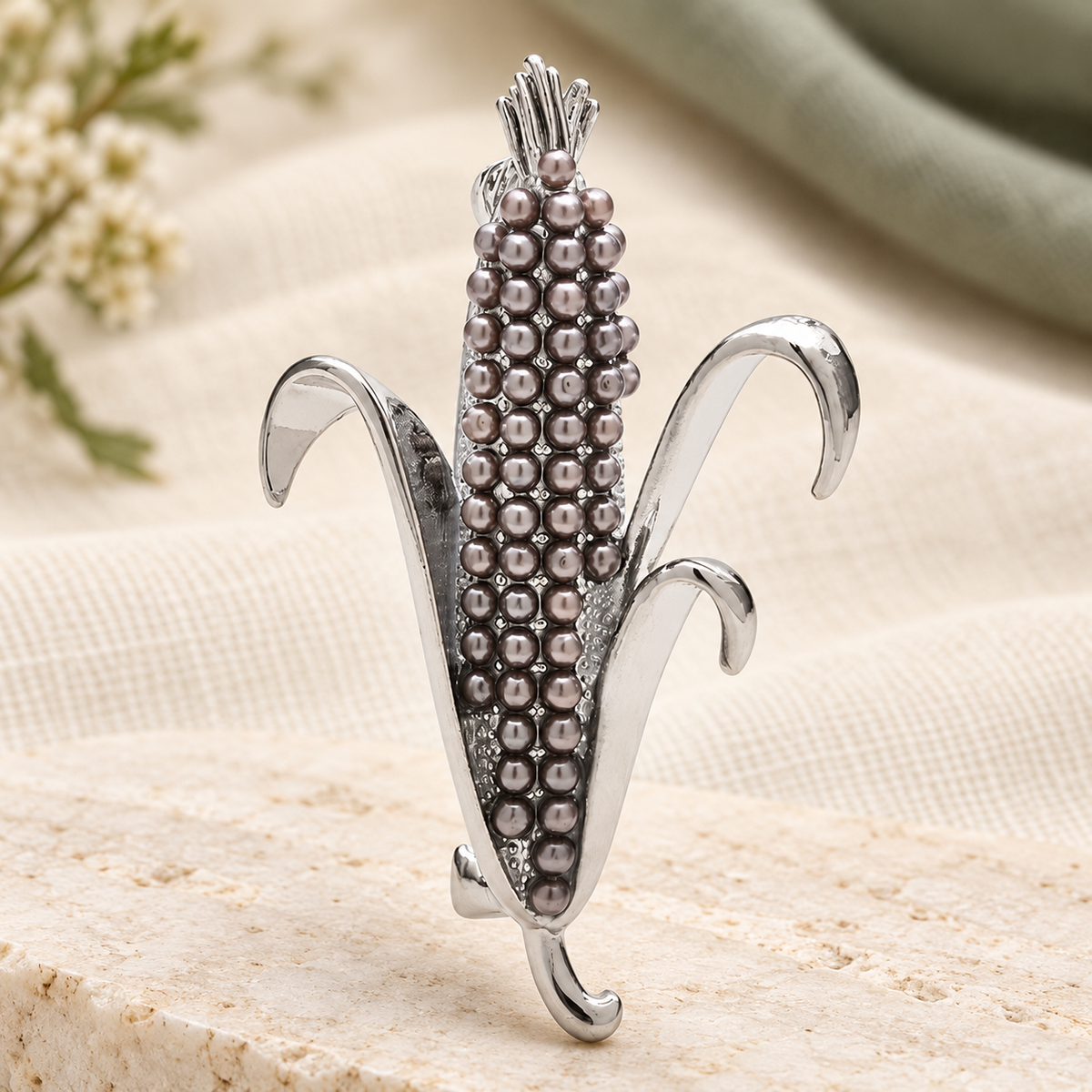 Pearl-Look Corn Cob Brooch — styled background