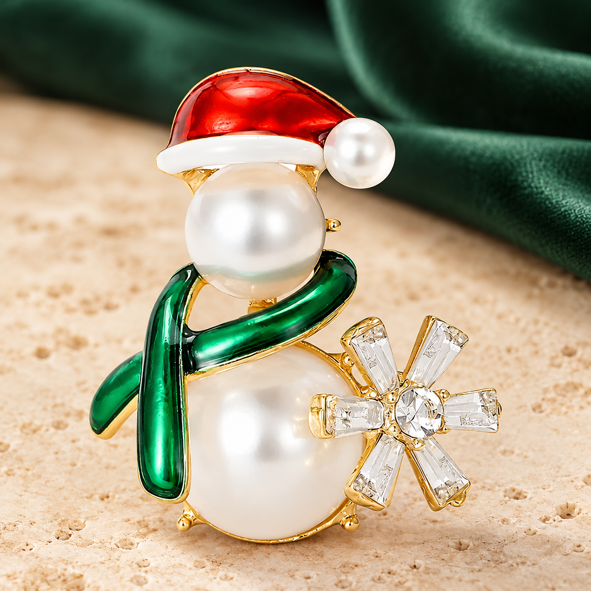 Pearl-Look Snowman with Green Scarf Brooch — styled background