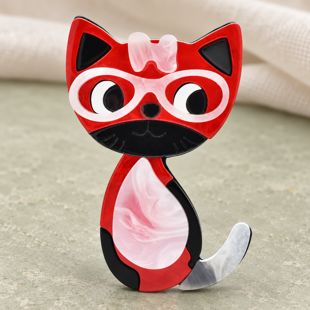 Acrylic Cat with Glasses and Bow Brooch — styled background
