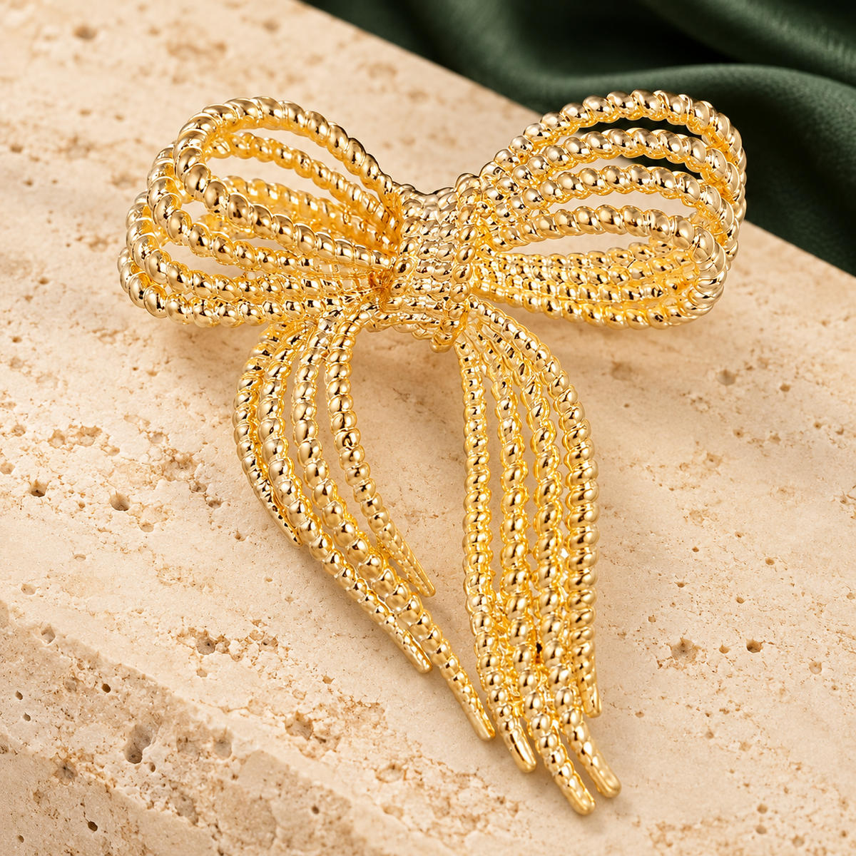 Beaded Ribbon Bow Brooch — styled background
