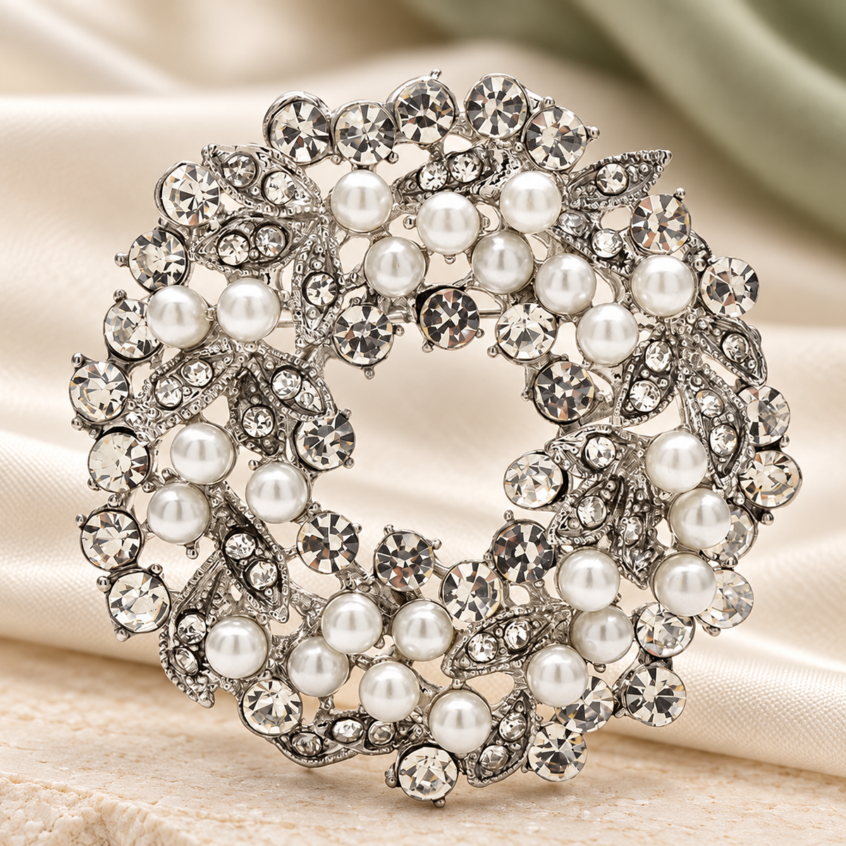 Rhinestone Flower Wreath with Pearl-Look Beads Brooch — styled background