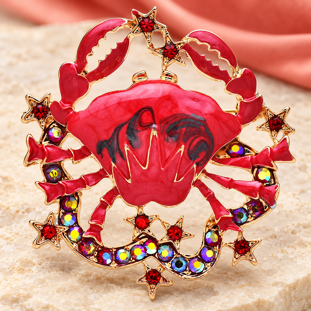 Red Enamel Crab with Jeweled Star Border Brooch — styled background