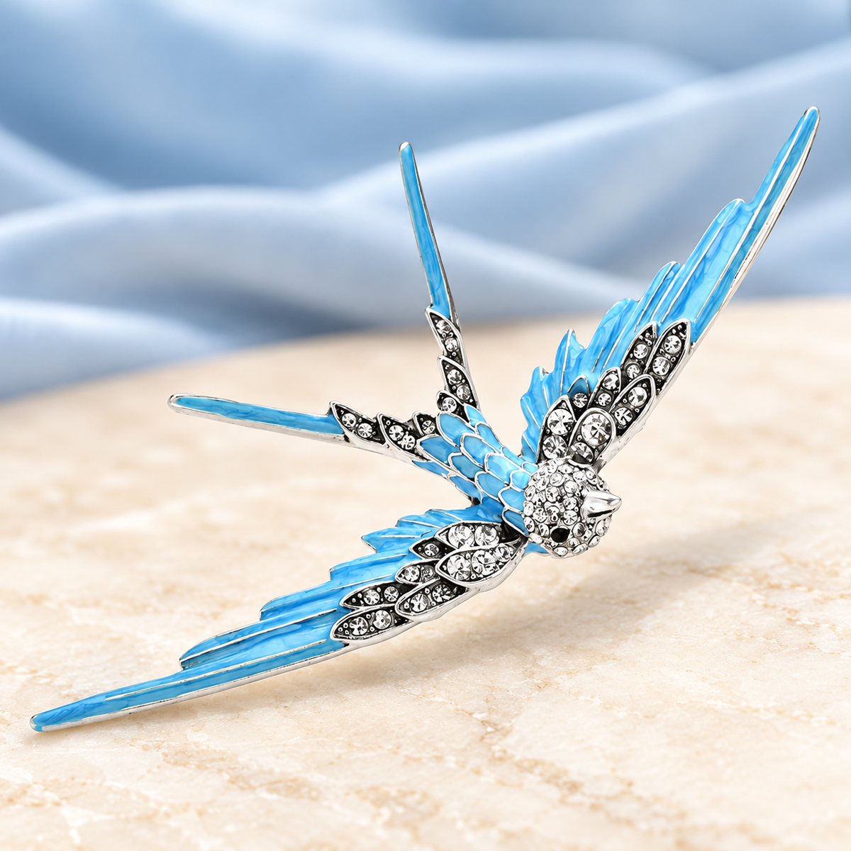 Large Enamel Swallow with Rhinestones Brooch — styled background