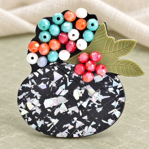 Acrylic Beaded Flower Bouquet Brooch — styled background
