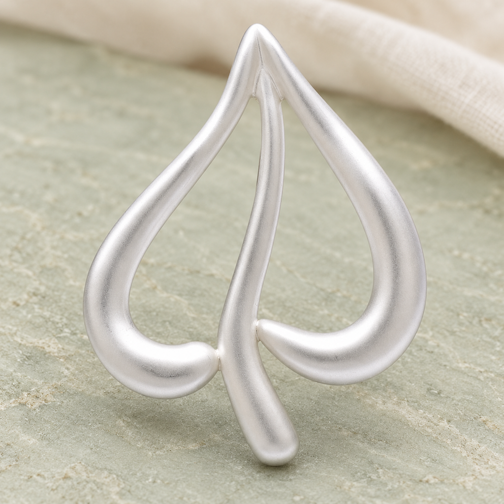 Open Heart Leaf Stainless Steel Brooch — styled background