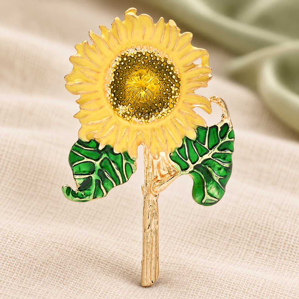 Enamel Sunflower on Leafy Stem Brooch — styled background
