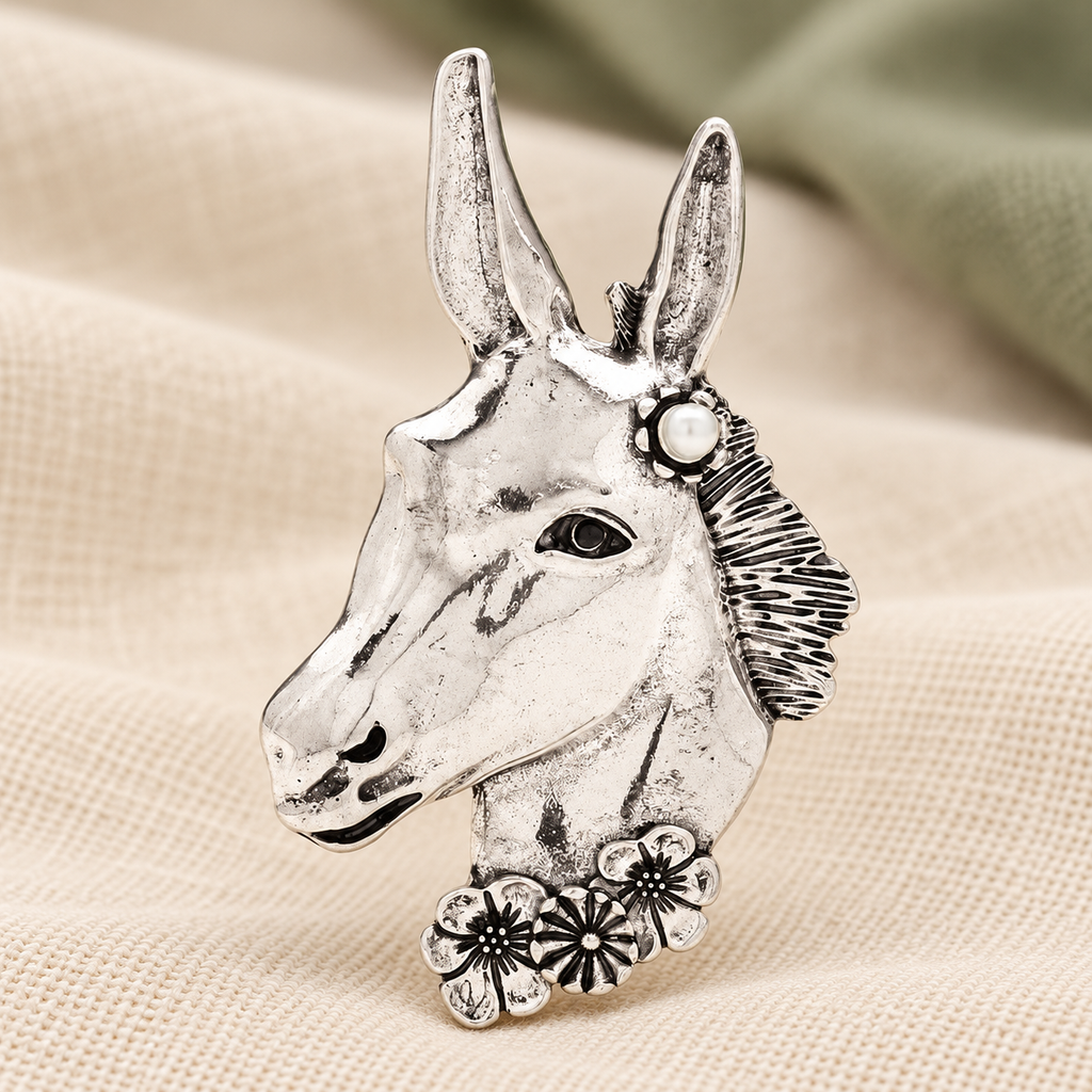 Long-Eared Equine Head with Flowers Brooch — styled background