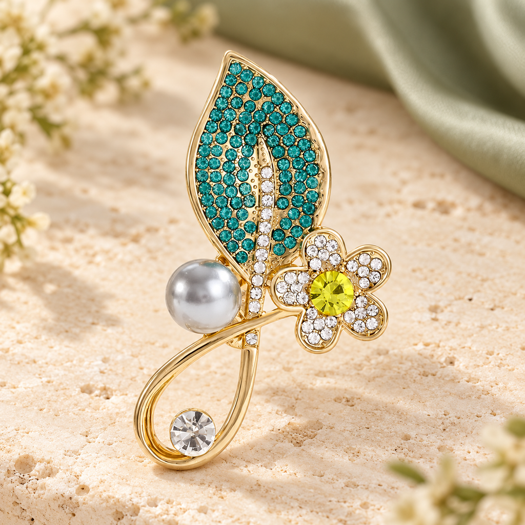 Rhinestone Leaf with Pearl-Look Accent Brooch — styled background