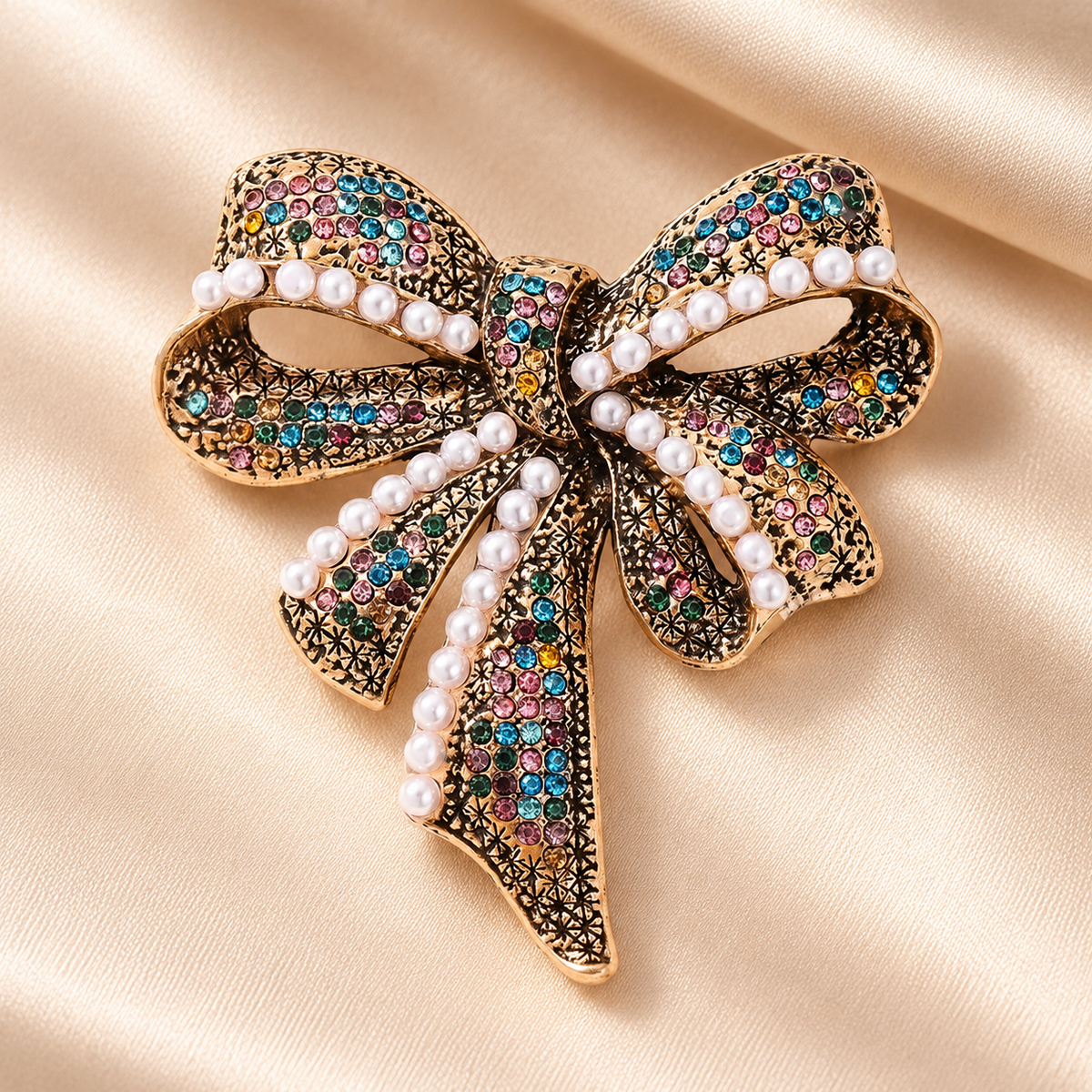 Vintage-Style Rhinestone Bow with Pearl-Look Beads Brooch — styled background