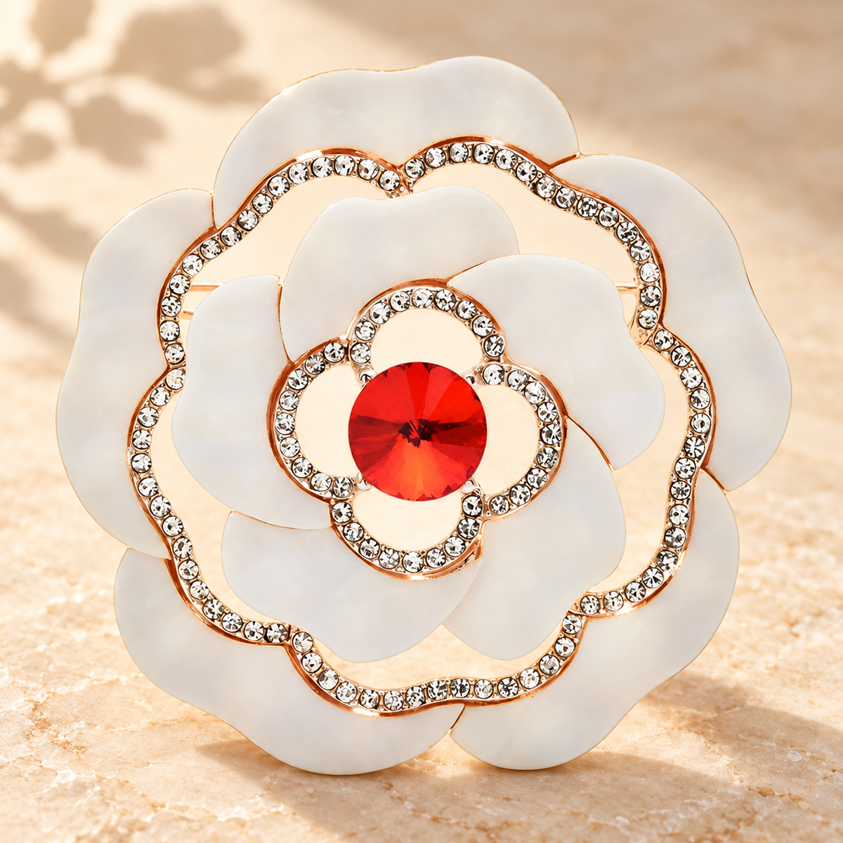 Layered White Flower with Faceted Center Brooch — styled background
