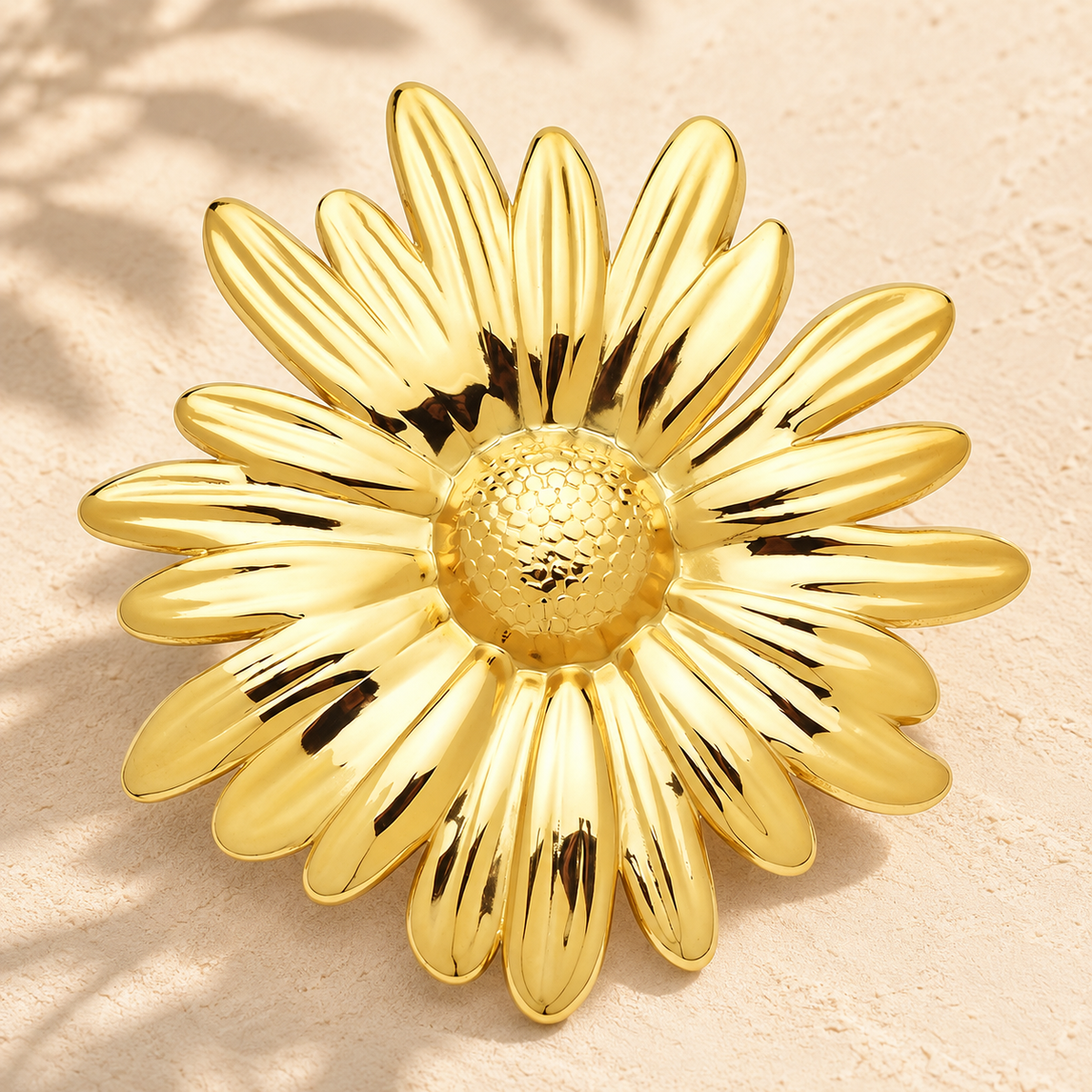 Polished Daisy Stainless Steel Brooch — styled background