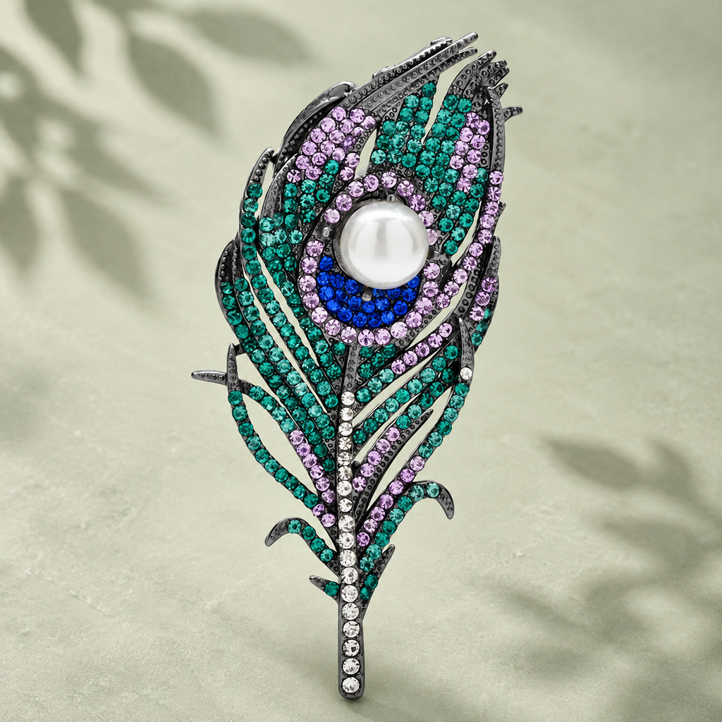 Jeweled Peacock Feather with Pearl-Look Center Brooch — styled background