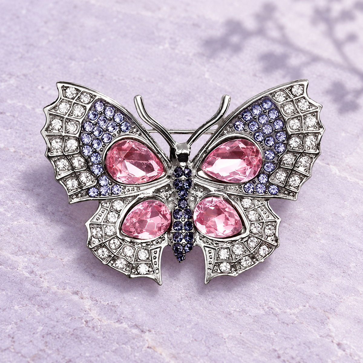 Petite Butterfly with Faceted Wing Accents Brooch — styled background