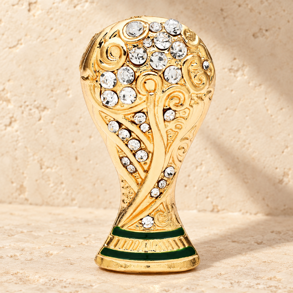 Jeweled Football Trophy Brooch — styled background