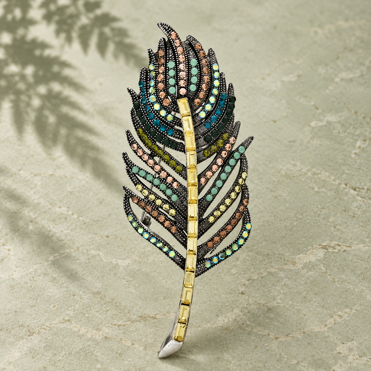 Vintage-Style Jeweled Feather Brooch — styled background