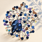 Vintage-Style Jeweled Floral Medallion Brooch — styled background