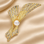 Rhinestone Ribbon Bow with Pearl-Look Center Brooch — styled background