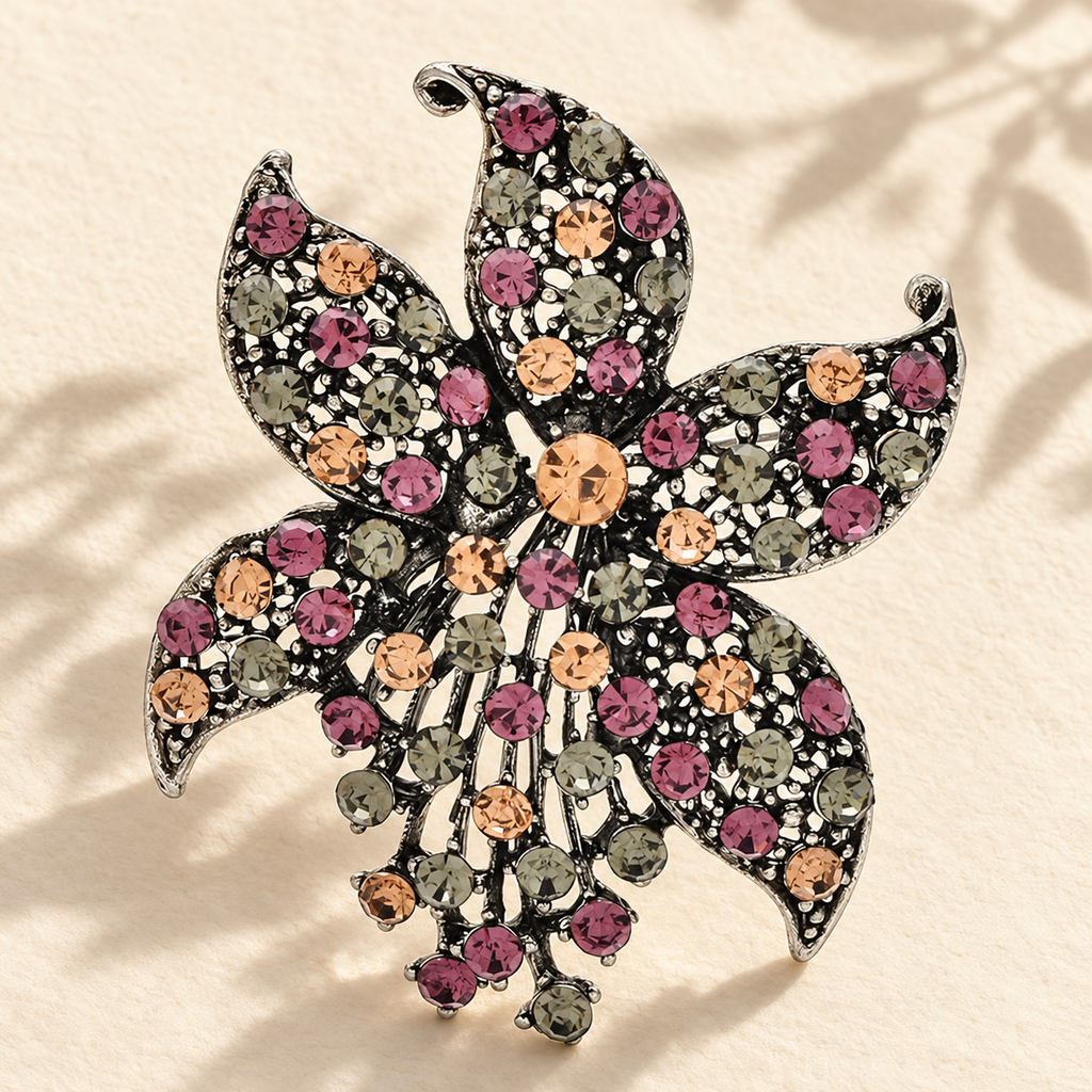 Vintage-Style Jeweled Flower with Pointed Petals Brooch — styled background