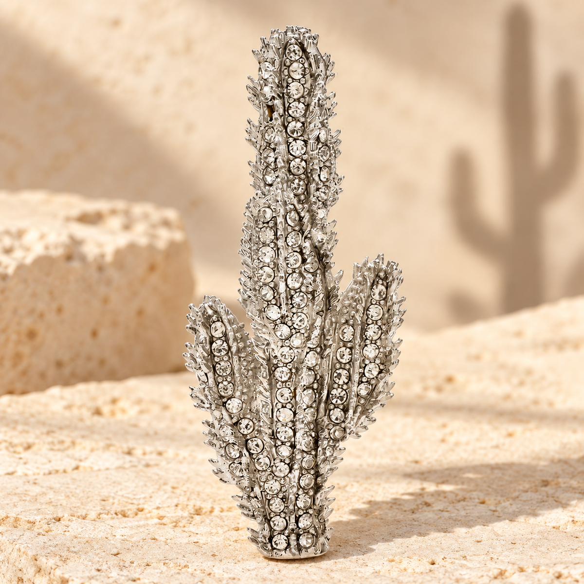 Clear Rhinestone Cactus Brooch — styled background