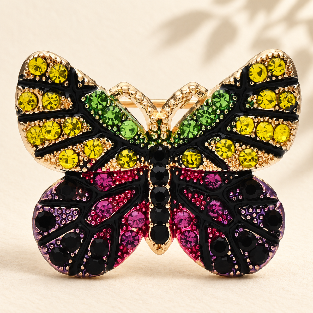 Petite Multicolor Rhinestone Butterfly Brooch — styled background