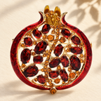 Jeweled Pomegranate with Enamel Rim Brooch — styled background