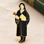 Enamel Lawyer in Gown Brooch — styled background