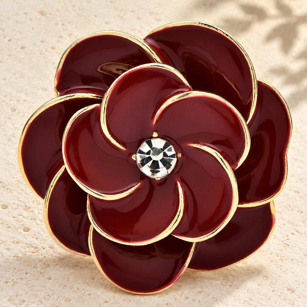 Deep Red Enamel Camellia Brooch — styled background