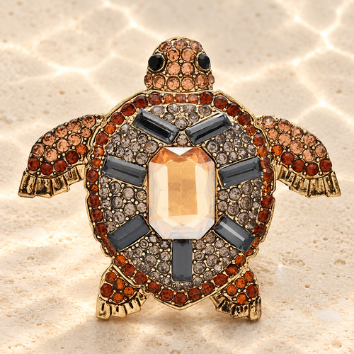 Amber-Tone Rhinestone Sea Turtle Brooch — styled background
