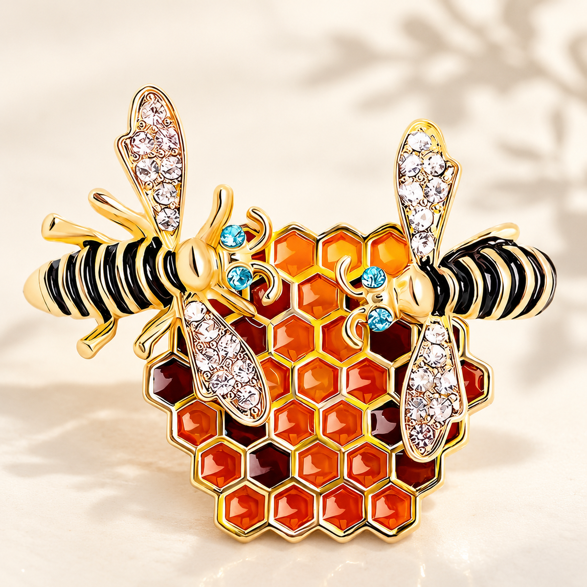 Bees on Amber Honeycomb Brooch — styled background