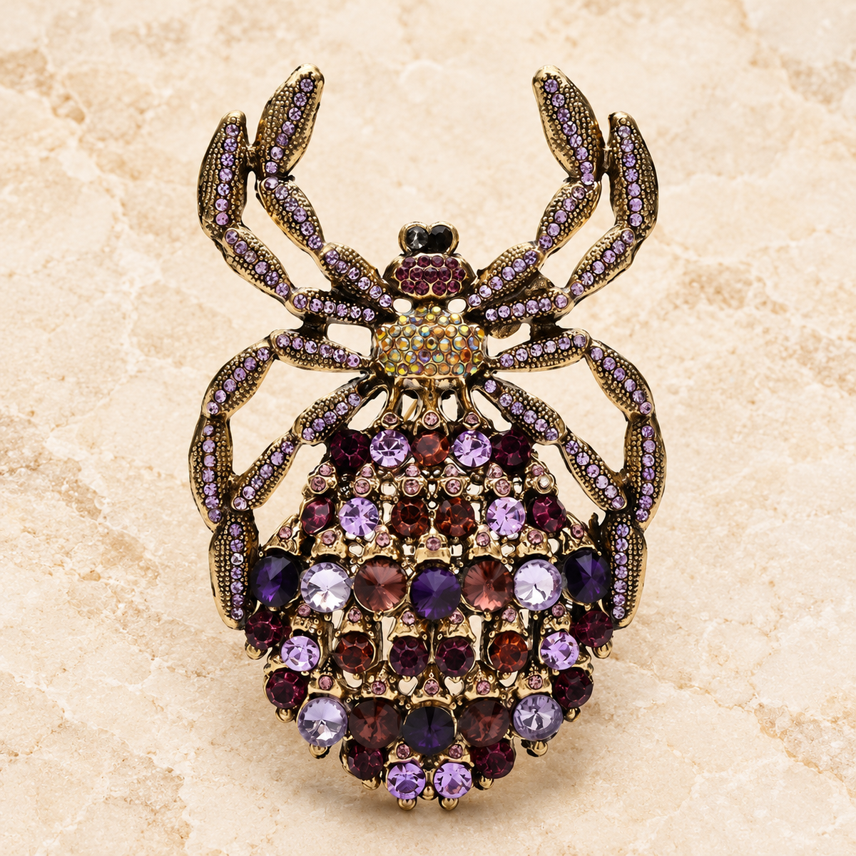 Oversized Jeweled Spider Brooch — styled background
