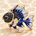 Enamel Fantail Fish with Rhinestones Brooch — styled background