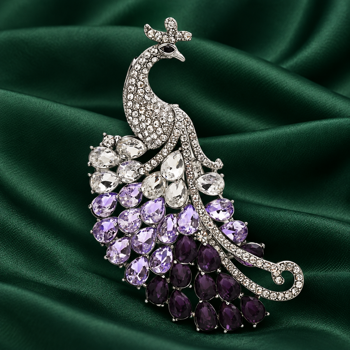Purple Faceted Peacock with Sweeping Tail Brooch — styled background