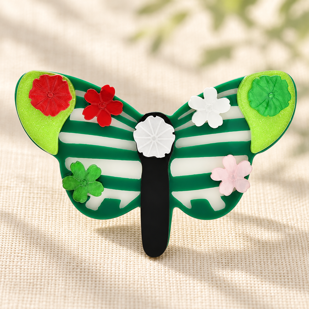 Floral Striped Acrylic Butterfly Brooch — styled background