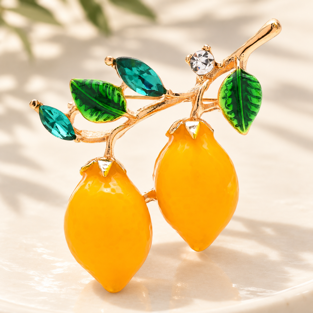 Yellow Enamel Lemon Branch Brooch — styled background