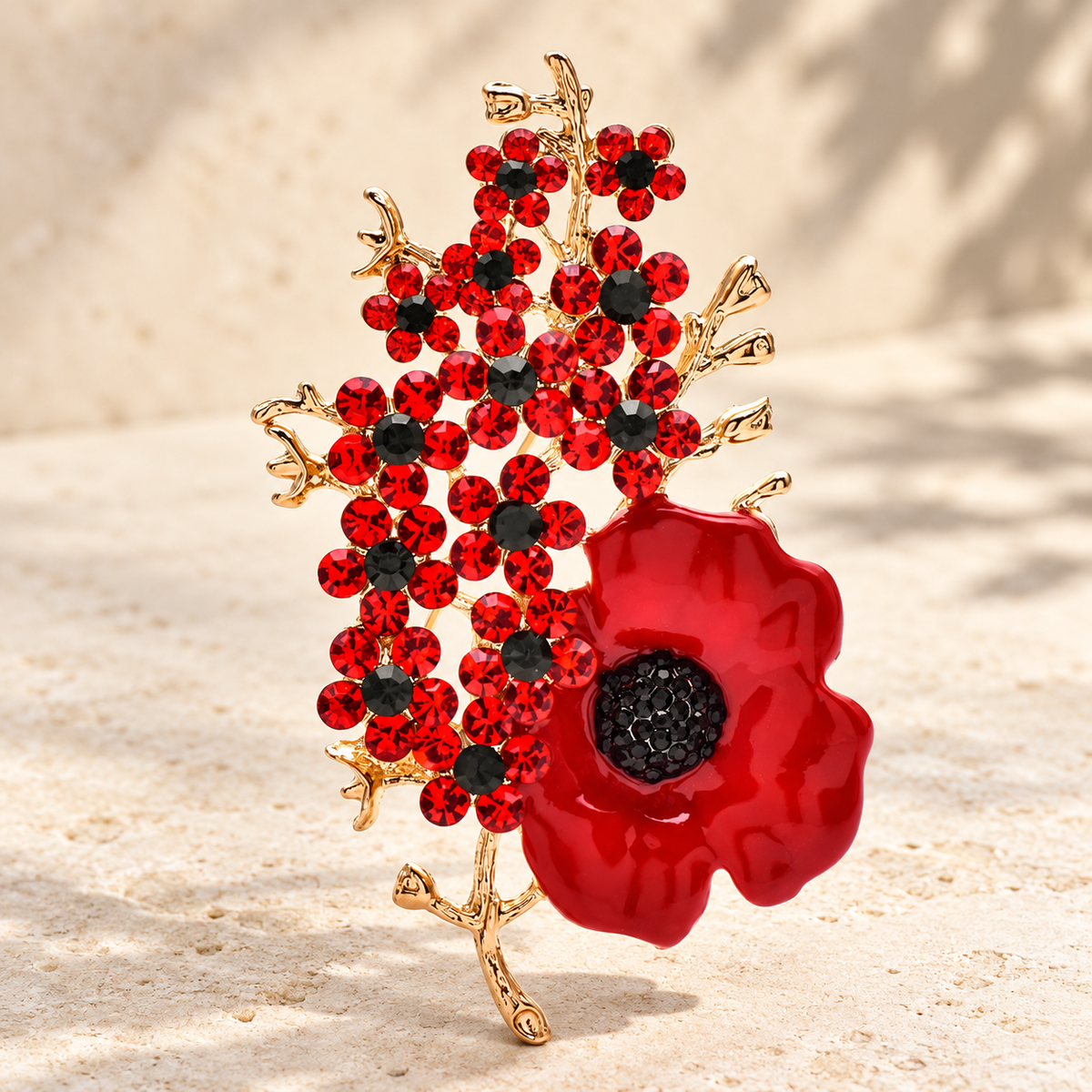 Red Enamel Poppy Spray Brooch — styled background