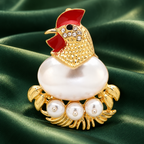 Hen and Pearl-Look Eggs Brooch — styled background