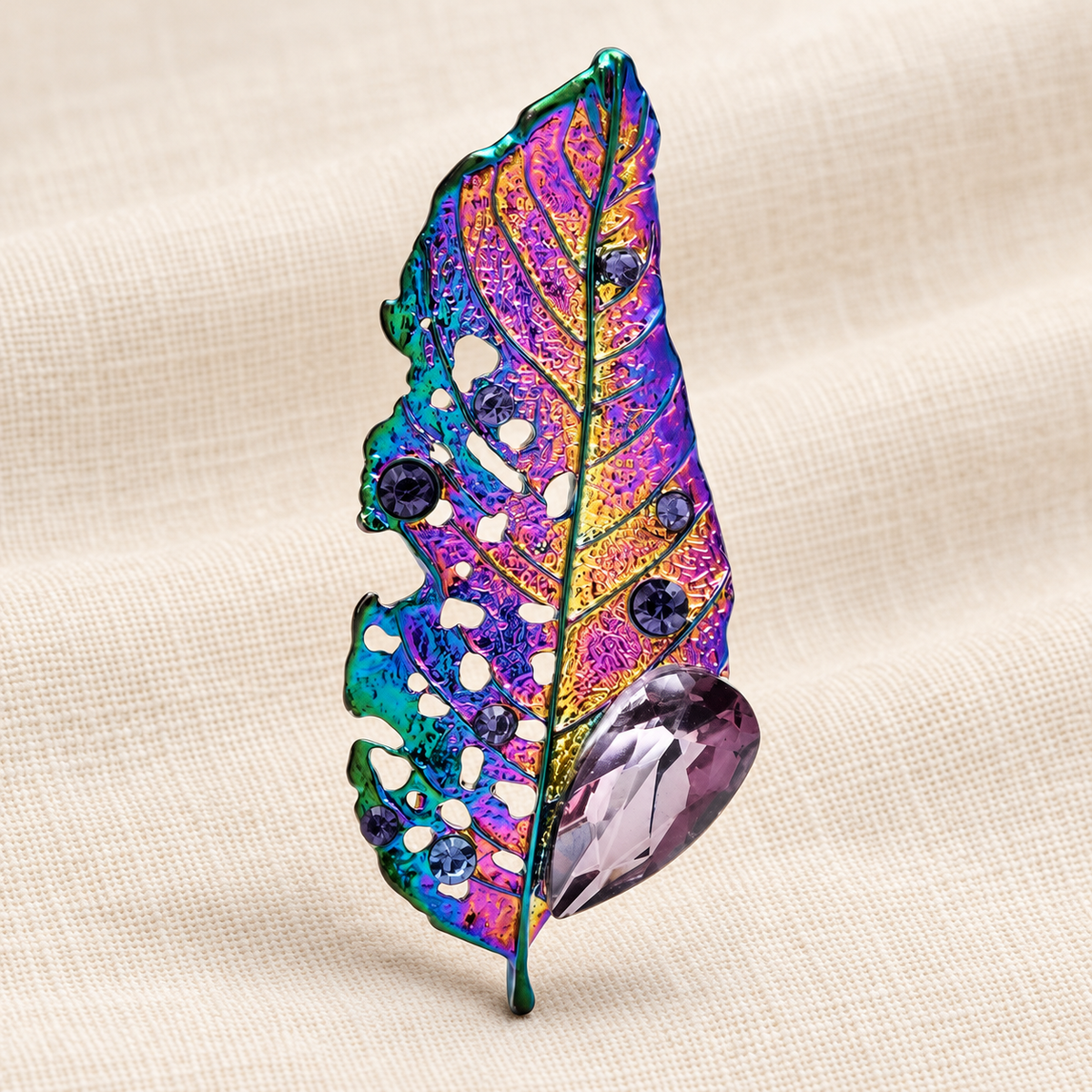 Iridescent Enamel Openwork Leaf Brooch — styled background