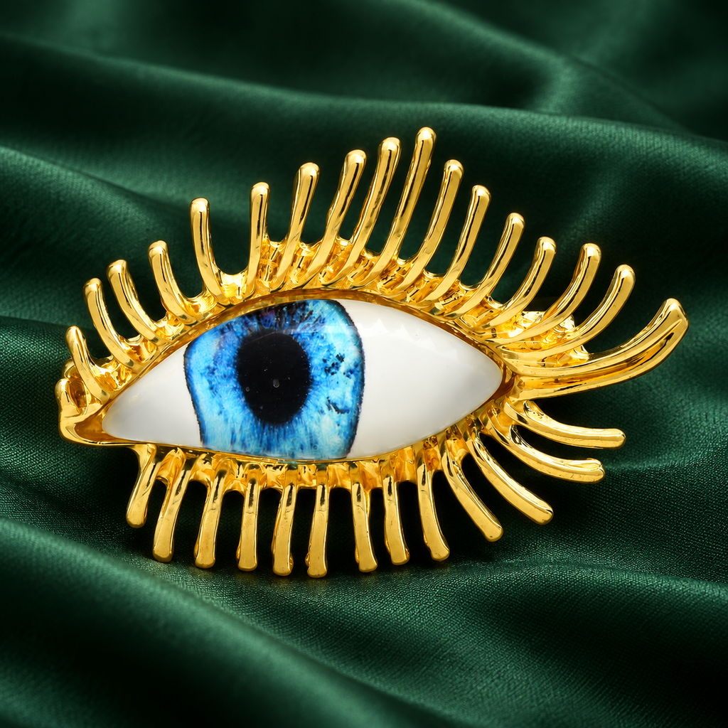 Blue Eye with Long Metal Lashes Brooch — styled background