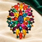 Radiant Faceted Stone Cluster Brooch — styled background