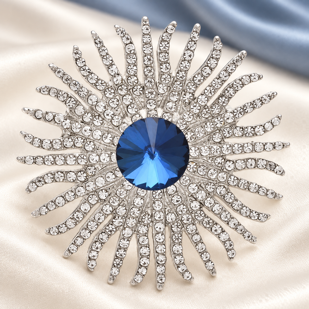 Jeweled Sunburst with Round Center Brooch — styled background