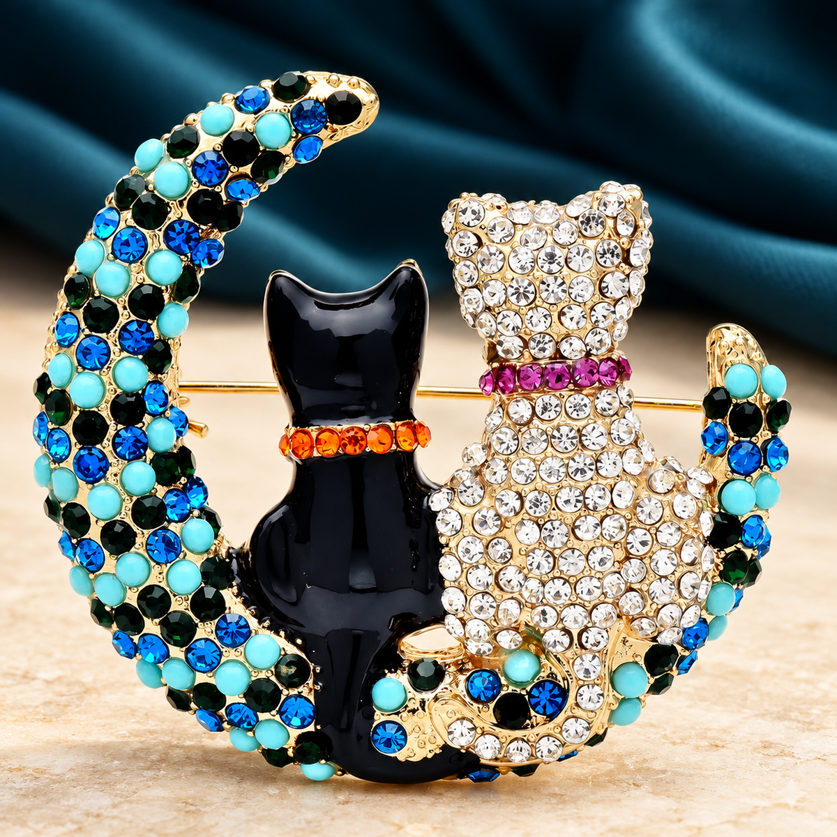 Moon Cats with Rhinestones Brooch — styled background