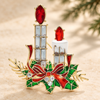 Christmas Candles with Holly Bow Brooch — styled background