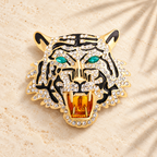 Jeweled Tiger Head with Green Eyes Brooch — styled background