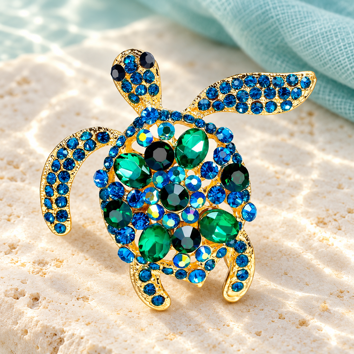 Green and Blue Rhinestone Sea Turtle Brooch — styled background