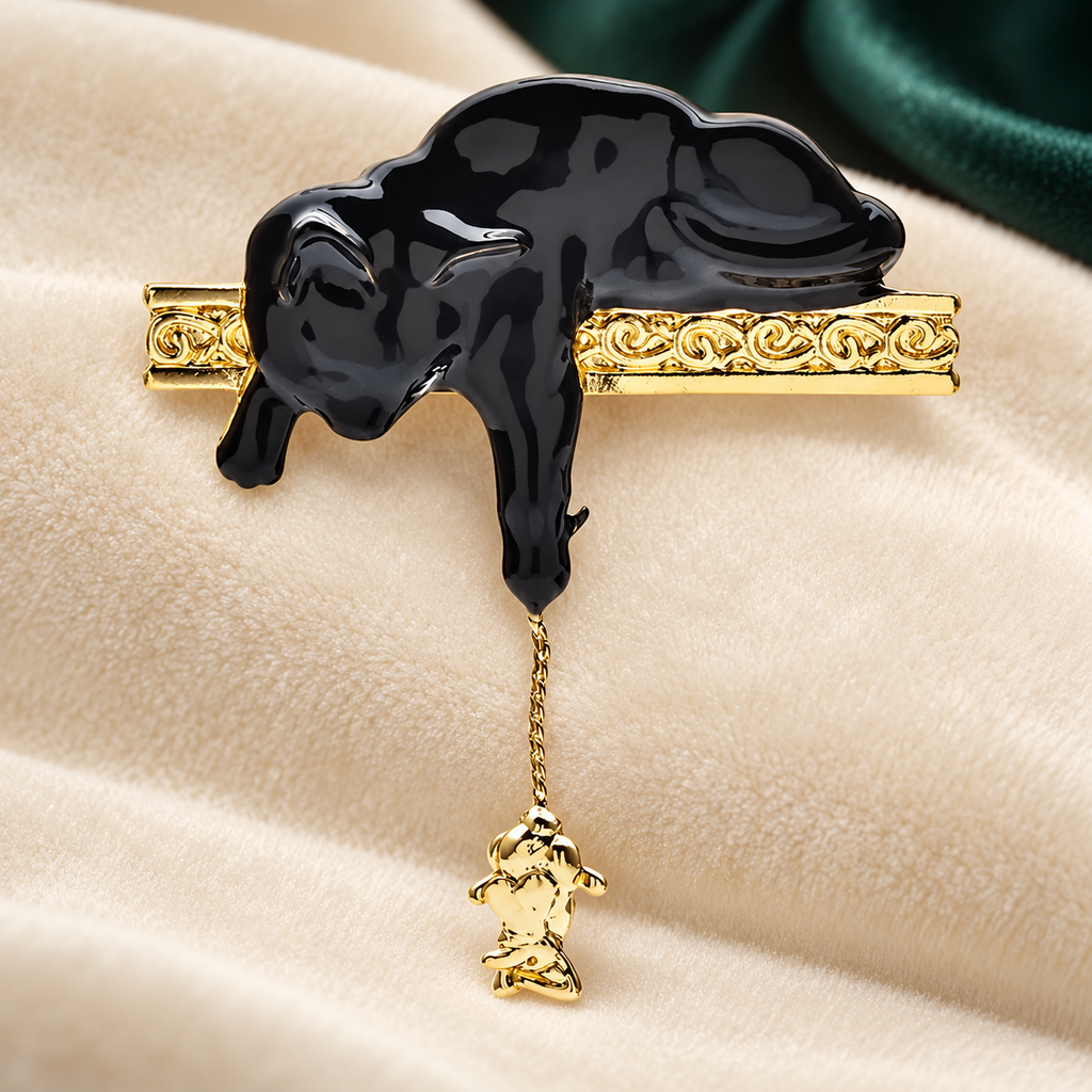 Enamel Cat with Dangling Mouse Brooch — styled background