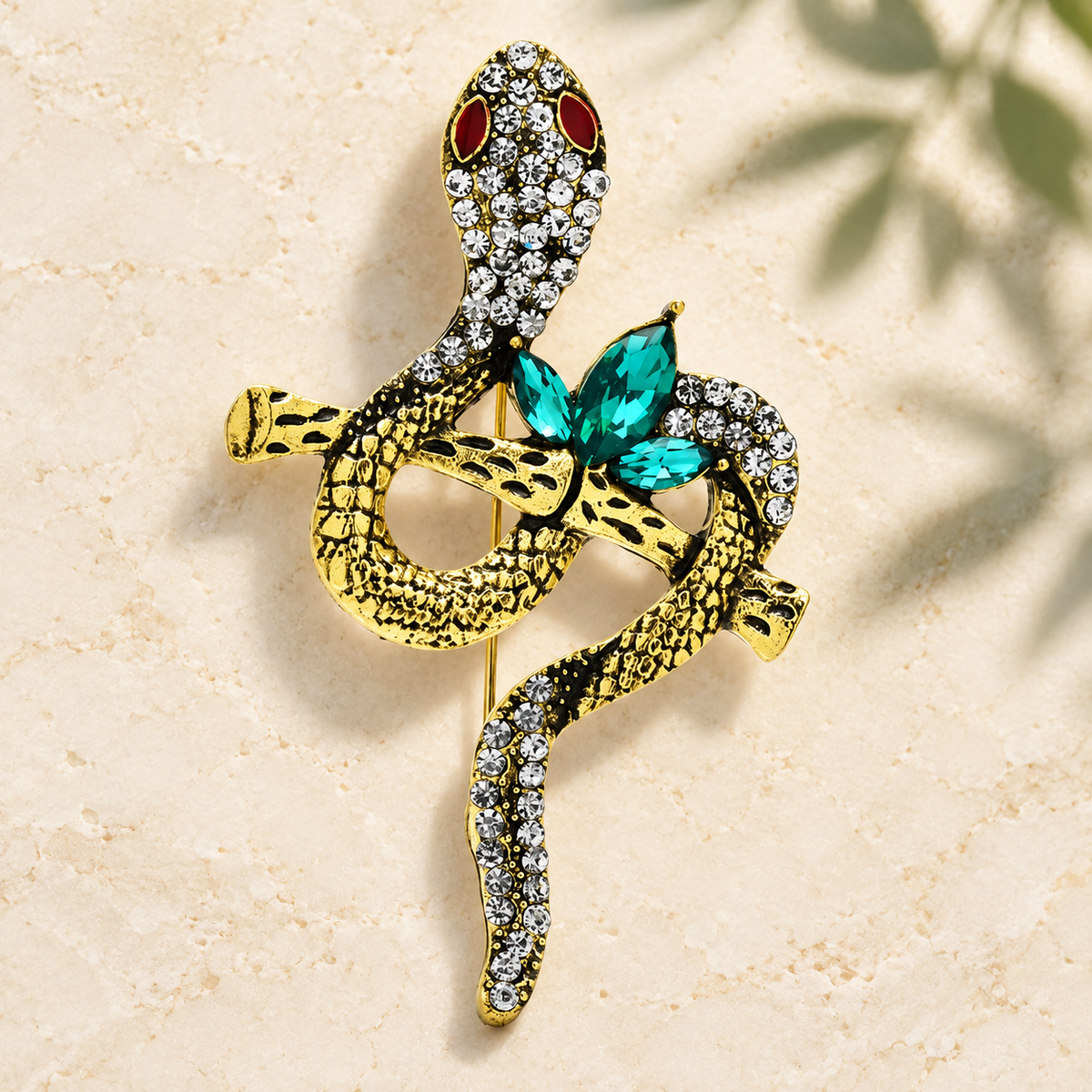 Jeweled Snake on Textured Branch Brooch — styled background